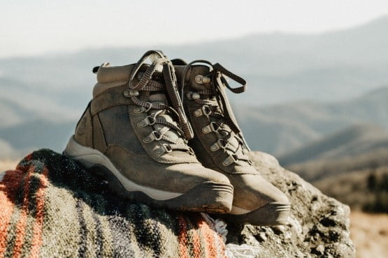 Hiking and trekking gear with shoes and boots